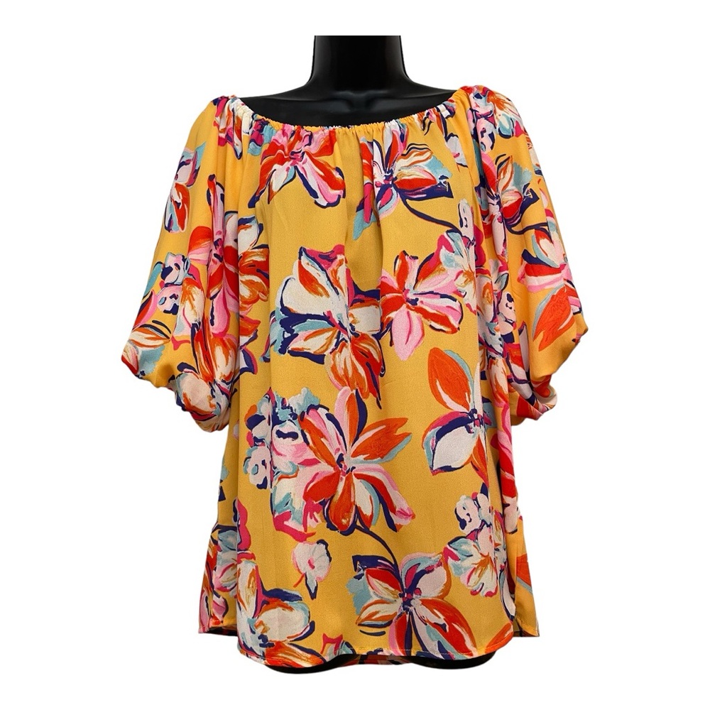 Women’s‎ size medium puff sleeved blouse.
